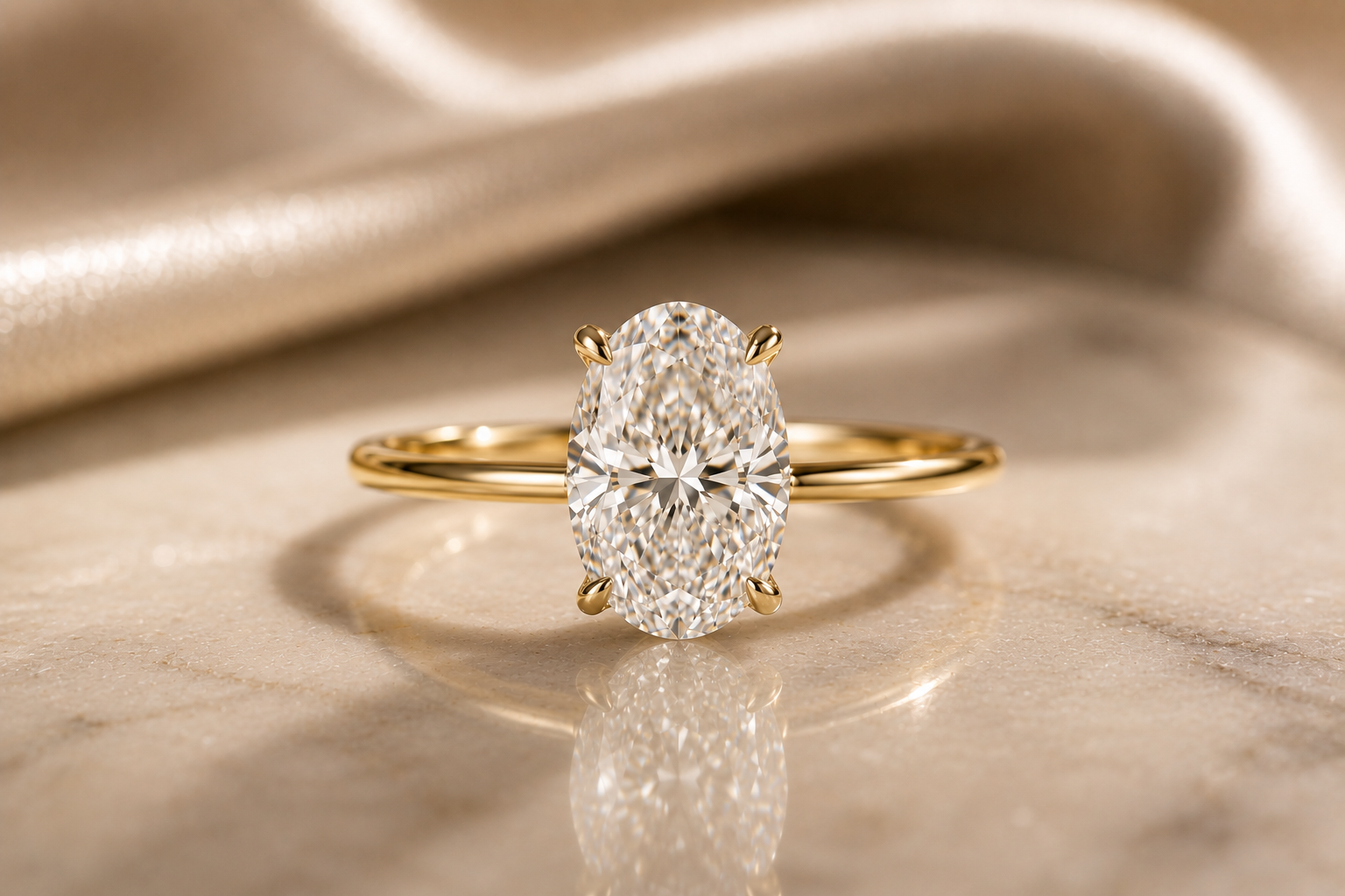 Oval solitaire, yellow gold